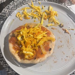 Rosari's Kitchen - Asada (steak) pupusa with red salsa and curtido (cabbage slaw)