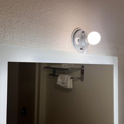 Super 8 by Wyndham Alma - The wiring to the new mirror doesn't meet code, didn't patch up the holes from the old fixture.