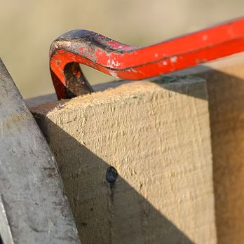 Pantojas Property Care - a person cutting a fence with a pair of scissors - Landscaping Near Me Pantojas Property Care - a person cutting a fence with a pair of scissors - Landscaping Near Me