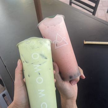 OMOMO Tea Shoppe - Matcha cortado and a fruit yakult strawberry with added boba - Coffee & Tea Near Me - Irvine, California OMOMO Tea Shoppe - Matcha cortado and a fruit yakult strawberry with added boba - Coffee & Tea Near Me - Irvine, California