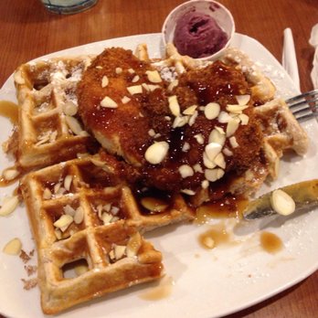 Dame's Chicken and Waffles - A panko-crusted chicken cutlet, a classic waffle, blueberry shmear, "drizzled" with almonds and plum sauce. Incredibly numnum - New American Near Me - Cary, North Carolina Dame's Chicken and Waffles - A panko-crusted chicken cutlet, a classic waffle, blueberry shmear, "drizzled" with almonds and plum sauce. Incredibly numnum - New American Near Me - Cary, North Carolina