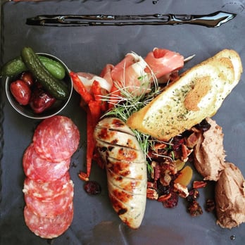 Le Hobbit - Charcuterie slate- pickles, salami, chorizo, prosciutto, sausage, fruit/nuts, mousse, toasted bread, balsamic syrup along the top. Delicious - French Near Me - Quebec City, Quebec Le Hobbit - Charcuterie slate- pickles, salami, chorizo, prosciutto, sausage, fruit/nuts, mousse, toasted bread, balsamic syrup along the top. Delicious - French Near Me - Quebec City, Quebec