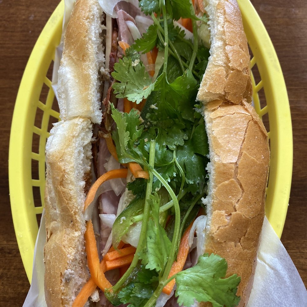 Saigon Sandwich House - Banh mi sandwich with 3 different pork cuts. A little spicy. - Vietnamese Near Me - Lowell, Massachusetts Saigon Sandwich House - Banh mi sandwich with 3 different pork cuts. A little spicy. - Vietnamese Near Me - Lowell, Massachusetts