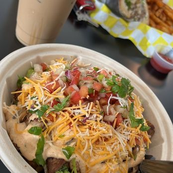Uptown Cafe - Iced caramel latte and jerk chicken bowl - Coffee & Tea Near Me - Chantilly , Virginia Uptown Cafe - Iced caramel latte and jerk chicken bowl - Coffee & Tea Near Me - Chantilly , Virginia