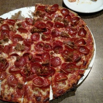 Emelio's - Large sausage and pepperoni - cooked to perfection. - Pizza Near Me - Columbus, Ohio