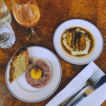 larrys - two plates of food and a glass of beer - Bars Near Me - Montreal, Quebec larrys - two plates of food and a glass of beer - Bars Near Me - Montreal, Quebec