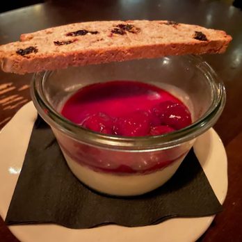 Sotto - Panna Cotta ($12) which is a seasonal cherry compote - Italian Near Me - Cincinnati, Ohio