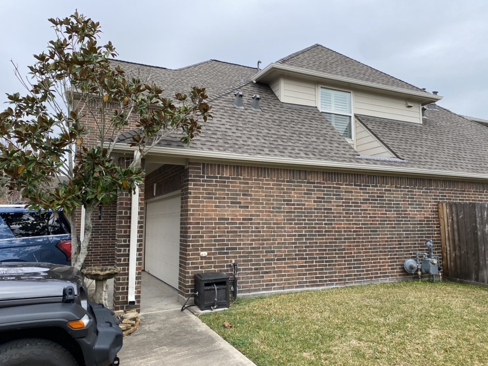 Slide of Redfish Roofing Company
