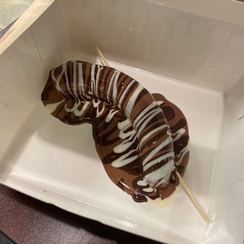 Chocolate Bash - Banana stick with milk, dark, and white chocolate - Desserts Near Me - Tustin, California Chocolate Bash - Banana stick with milk, dark, and white chocolate - Desserts Near Me - Tustin, California