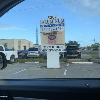 The Aluminum Store - Their sign - Windows Installation Near Me - Naples, Florida