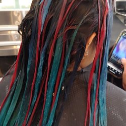 Roger Francis Hairstylist - Application of deep reds purples and blues