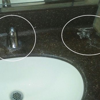Wendy's - Old soap scum collection in the corner and junk around wiggly loose spigot. - Burgers Near Me - Port Orchard, Washington