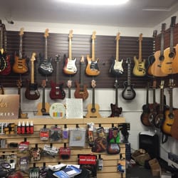 Sound Check Music Center - Great selection of strats and telecasters well priced.