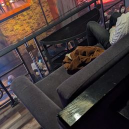 The front row of the box seats is a three person couch, that they expect 4 people to sit in. You are not told this at booking.