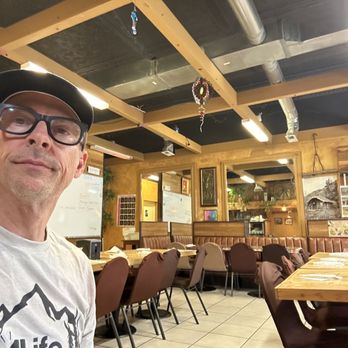 Yummy Thai - a man in a restaurant - Thai Near Me - Payson, Utah