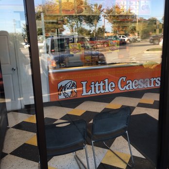 Little Caesar's Pizza - two chairs in front of a window - Pizza Near Me - Lakeland, Tennessee Little Caesar's Pizza - two chairs in front of a window - Pizza Near Me - Lakeland, Tennessee