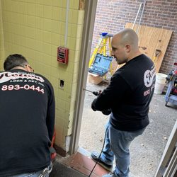 Action Lock & Key - Drilling holes for anchors, Door and frame installment