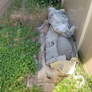 Cornerstone Property Management - CPM July '19 inspection pic of "dirty debris/boxes" they wanted us to pay them to remove (same boxes) - Property Management Near Me - Meridian, Idaho