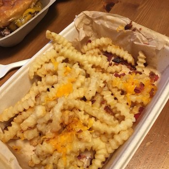 American Grub - Bacon Cheese Fries = uncooked, VERY lightly fried french fries. So when you add the shredded cheese, it doesn't really melt. - Burgers Near Me - Tustin, California American Grub - Bacon Cheese Fries = uncooked, VERY lightly fried french fries. So when you add the shredded cheese, it doesn't really melt. - Burgers Near Me - Tustin, California