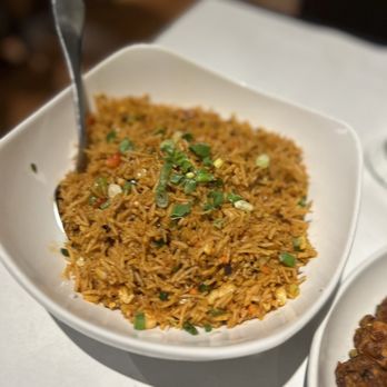 Clove Indian Bistro - a bowl of rice and a plate of food - Indian Near Me - Columbus, Ohio Clove Indian Bistro - a bowl of rice and a plate of food - Indian Near Me - Columbus, Ohio