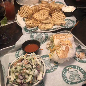 Malone's Bar & Grill - Buffalo chicken wrap with cole slaw. Waffle fries and seasoned sour cream. - New American Near Me - Maple Grove, Minnesota Malone's Bar & Grill - Buffalo chicken wrap with cole slaw. Waffle fries and seasoned sour cream. - New American Near Me - Maple Grove, Minnesota