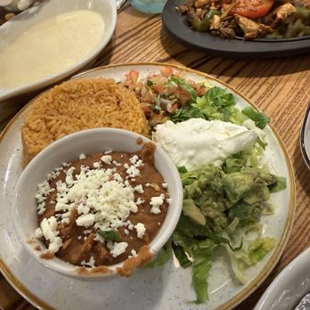 Fuego Social - Sides that come with fajitas. - Mexican Near Me - Jacksonville Beach, Florida Fuego Social - Sides that come with fajitas. - Mexican Near Me - Jacksonville Beach, Florida