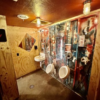 The Back 40 Taphouse Grill - urinals and sinks - American Near Me - Mitchell, South Dakota
