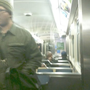Blue Line CTA - man clipping beard on train - Trains Near Me Blue Line CTA - man clipping beard on train - Trains Near Me