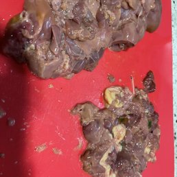Chicken liver. Note the discarded pile on right with black spots.