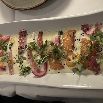 Pacifica Seafood Restaurant - Salmon Crudo = very disappointing. Check out the 3 tiny stingy scraps on the left side of plate. SMH. And where's the Kumquats? - Seafood Near Me - Palm Desert, California