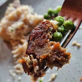 Lucky Restaurant - The Smoked Seven Hills Meatloaf with brisket, pork, shoulder, house bacon, peas, and carrots. - Wine Bars Near Me - Roanoke, Virginia Lucky Restaurant - The Smoked Seven Hills Meatloaf with brisket, pork, shoulder, house bacon, peas, and carrots. - Wine Bars Near Me - Roanoke, Virginia