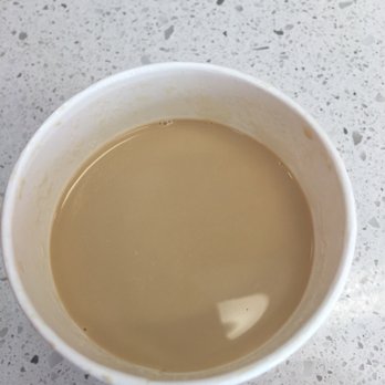 Dunkin' - a cup of coffee and a spoon - Donuts Near Me - Davie, Florida Dunkin' - a cup of coffee and a spoon - Donuts Near Me - Davie, Florida