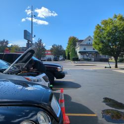 East Avenue Auto - The first of many trips under the hood.  A smile every time though.