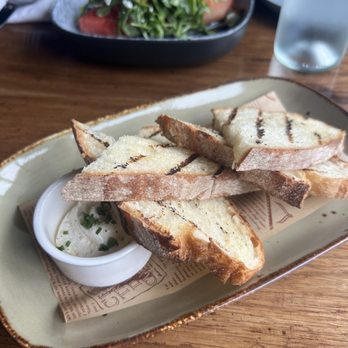 Farm & Fork Kitchen - Truffle sea salt grilled bread - Cocktail Bars Near Me - Ashburn, Virginia Farm & Fork Kitchen - Truffle sea salt grilled bread - Cocktail Bars Near Me - Ashburn, Virginia