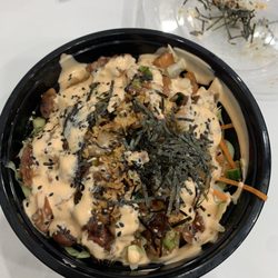 Poke Monster - Monster Bowl with spicy sauce - Tuna. Salmon , and Shrimps with rice and salad.
