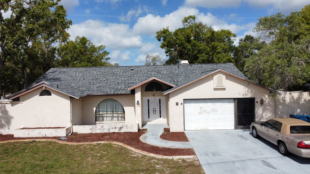 Slide of Steadfast Roofing