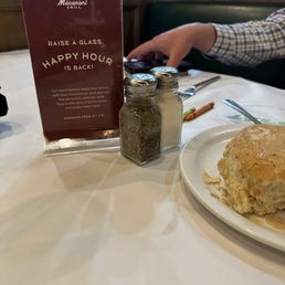 Advisements of happy hour on every table.