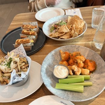 Earls Kitchen + Bar - Buffalo Cauliflower, Truffle Fries, shrimp sushi tacos, avocado dip - New American Near Me - McLean, Virginia Earls Kitchen + Bar - Buffalo Cauliflower, Truffle Fries, shrimp sushi tacos, avocado dip - New American Near Me - McLean, Virginia