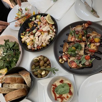 Milligram - Marinated olives, house made dips, bruschetta, chop chop salad, and prosciutto salad - Cafes Near Me - Costa Mesa, California Milligram - Marinated olives, house made dips, bruschetta, chop chop salad, and prosciutto salad - Cafes Near Me - Costa Mesa, California