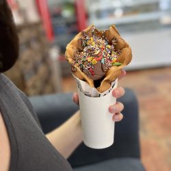 Bonjour - Nutella bubble waffle with chocolate, sprinkles, and fruity pebbles