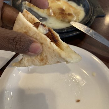 Gus & Us Grill - The bread with the Saganaki - Greek Near Me - Allen Park, Michigan