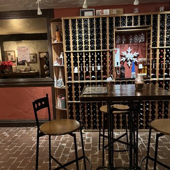 The Good Life - a wine cellar with wine bottles - Wine Bars Near Me - Solvang, California