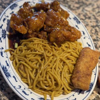 Lee's golden Buddha Restaurant - General Zuo's Chicken with Lo mein - Chinese Near Me - Oakwood, Georgia Lee's golden Buddha Restaurant - General Zuo's Chicken with Lo mein - Chinese Near Me - Oakwood, Georgia