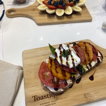 Toastique - Tomato burrata & PB crunch - Juice Bars & Smoothies Near Me - Balboa Island, California Toastique - Tomato burrata & PB crunch - Juice Bars & Smoothies Near Me - Balboa Island, California