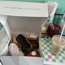 Iced mocha and six assorted donuts