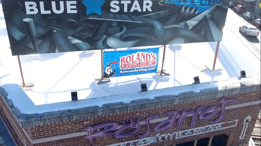 Slide of Roland's Roofing
