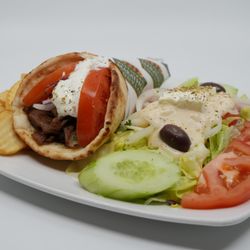 Pork Gyron Pita: Thinly sliced & wrapped in a pita with tomatoes, onions, tzatziki & oregano