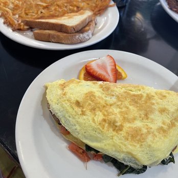 Sweet E's Cafe - Spinach and feta omelette with hashbrowns and toast - Cafes Near Me - Honolulu, Hawaii Sweet E's Cafe - Spinach and feta omelette with hashbrowns and toast - Cafes Near Me - Honolulu, Hawaii
