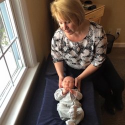 Shrewsbury Family Chiropractic - Dr. Lauren adjusting this little one so she reaches her full potential.