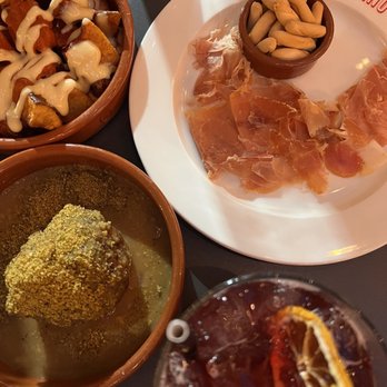 Bar Molino - Patatas bravas (top left) albondiga (bottom) jamon iberico (top right) - Tapas/Small Plates Near Me - Jacksonville, Florida Bar Molino - Patatas bravas (top left) albondiga (bottom) jamon iberico (top right) - Tapas/Small Plates Near Me - Jacksonville, Florida